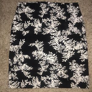 Knee length black and white floral pattern skirt